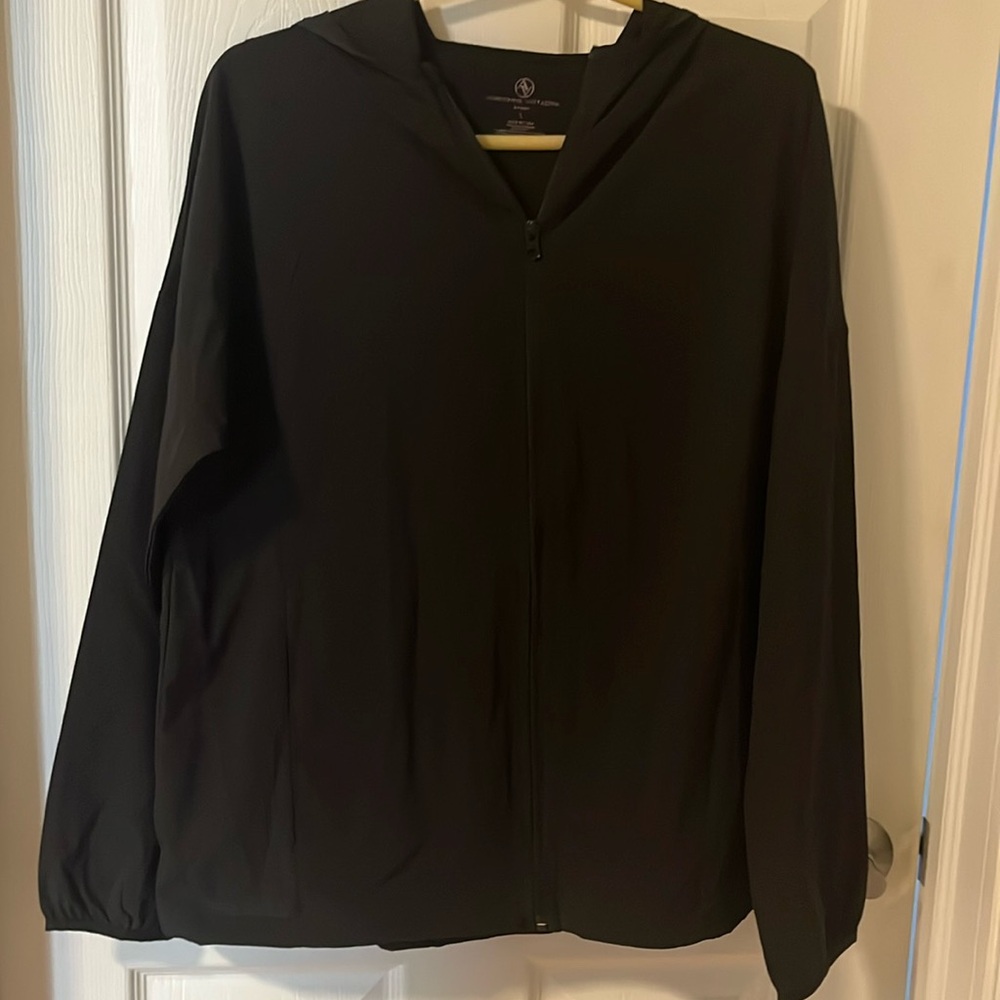 NWOT Adrienne Vittadini black sport light weight zip jacket. Size large.